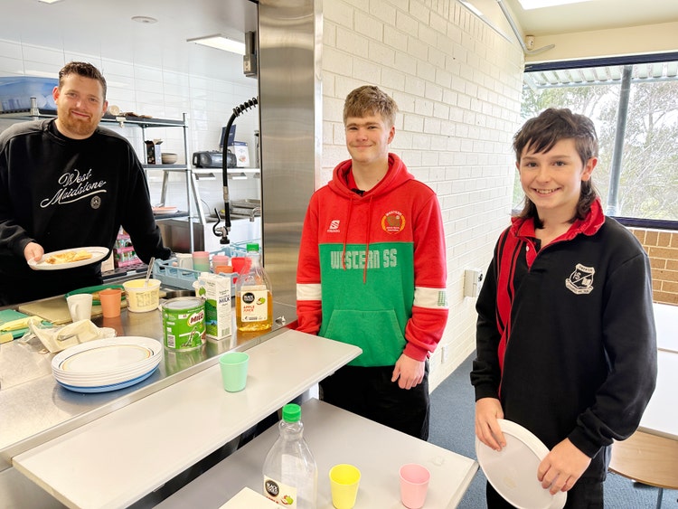 students eating breakfast at breakfast club